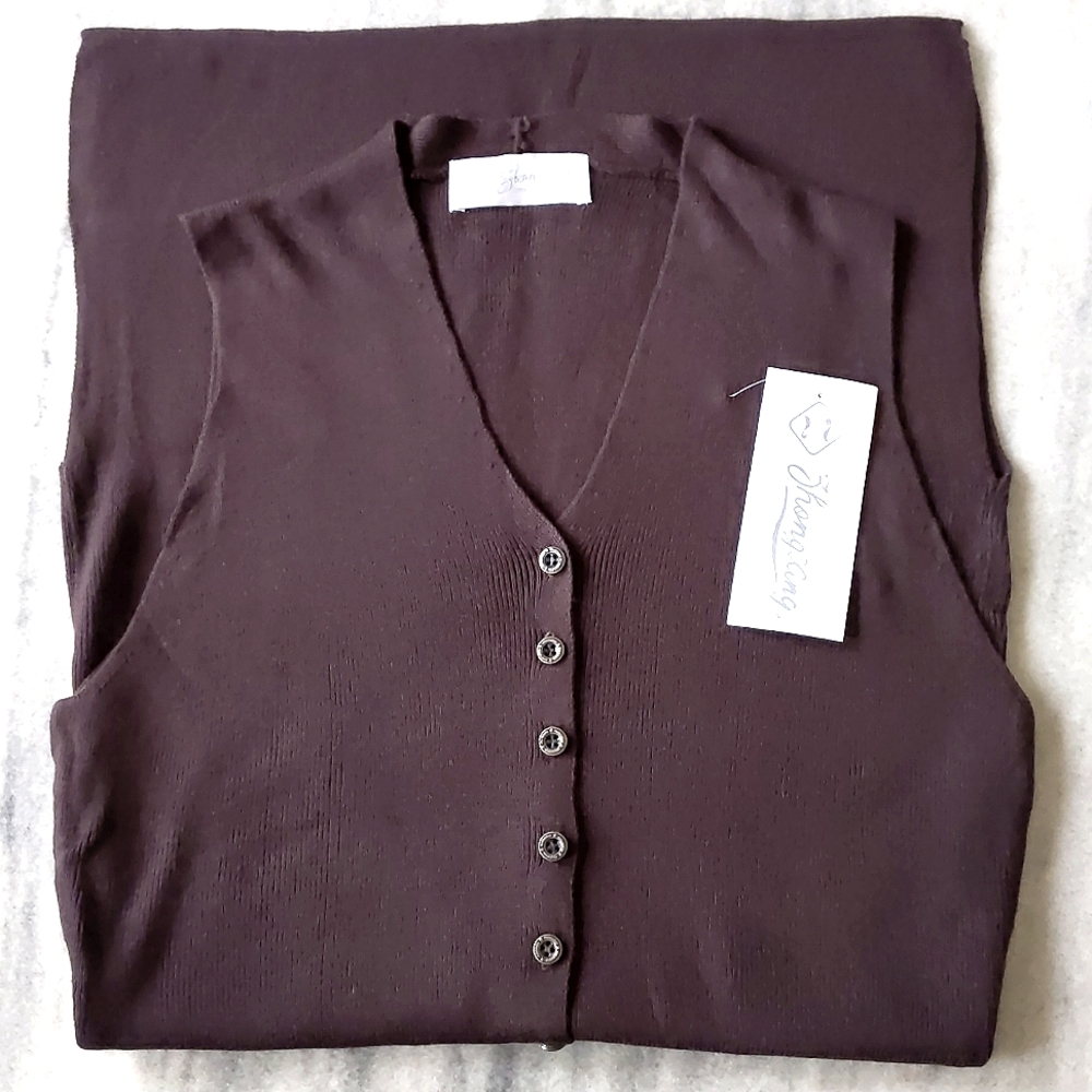 NWT. Woman's Long knit sweater vest with buttons, front and side openings.